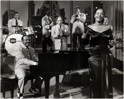 karamazove:  Count Basie  and  Billie Holiday in a Universal International musical short, 1951. 