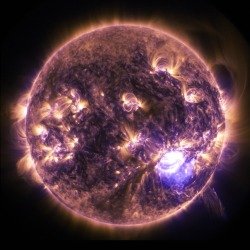 NASAs Solar Dynamics Observatory captured this image of a significant solar flare as seen in the bright flash on the right on Dec. 19, 2014. The image shows a subset of extreme ultraviolet light that highlights the extremely hot material in flares