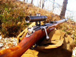 gunrunnerhell:  Mosin Nagant 91/30 PU The most common sniper rifle variant of the Mosin Nagant. The bolt handle on most if not all Mosin snipers are longer and bent which allows them to clear the scope during cycling. It is very easy to make a replica