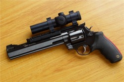 gunrunnerhell:  Raging Bull 454The most common and still in production model from the Taurus Raging Bull family. Since it’s chambered in .454 Casull it can also safely chamber and fire .45 Colt. It’s an effective large caliber hunting revolver, where