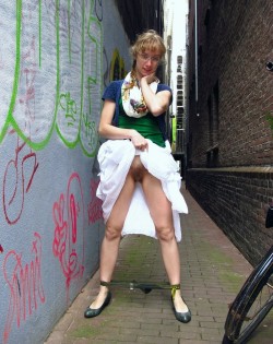 beijingercouple:  What a naughty nerd! Are all like this?  Gretchen flashes all over Amsterdam for Abbywinters.