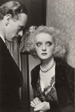 Leslie Howard and Bette Davis in Of Human Bondage, 1934. A World of Movies: 70 Years of Film History, by Richard Lawton (Octopus, 1981).  From a charity shop in Sherwood, Nottingham.