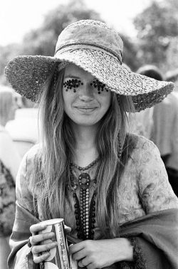 sawlonewolf:  Does anyone know who this hippie girl is from 60s Woodstock festival? I’ve always been so curious about her. Shes mesmerizing.