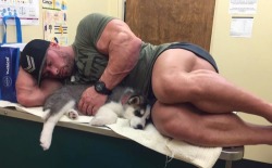 Joey Sergo - Comforting his pup while she gets vaccinations.