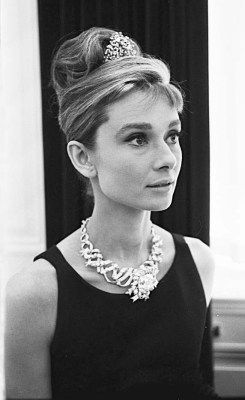 timelessaudrey:  Audrey photographed by Morris Warman during trying on 躔.000 necklace for the movie Breakfast at Tiffany’s, October 1960