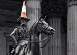 fandomdrunk:  modmad:  weasley-detectives:  scottish-badger:  OK SO EVERYTHING YOU NEED TO KNOW ABOUT GLASGOW YOU WILL KNOW FROM THIS STATUE THIS MY FRIENDS IS THE DUKE OF WELLINGTON STATUE IN ROYAL EXCHANGE SQUARE IN GLASGOW AND YES HE HAS A TRAFFIC
