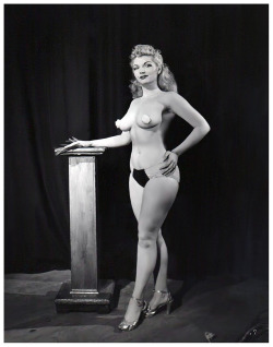 Marlane              (aka. Jean Marlane)Appearing in a publicity still promoting the 1953 burlesque film: “PEEK A BOO”; a documentary-style recording of a complete Burlesk show; filmed at Los Angeles’ ‘FOLLIES Theatre’..