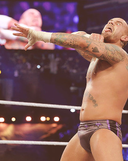 rwfan11:  CM Punk- mocking the Undertaker…nice bulge! ….and is that a wet spot!? ………he was either scared by &lsquo;Taker or turned on by him….or it could just be dick sweat….LOL! 