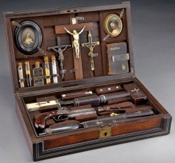 steampunktendencies: Vampire Hunter Kit &ldquo;Cased vampire killing kit, in a rosewood and ebony case with inlaid silver stringing and mother-of-pearl inlaid plaque. Contents include a black powder percussion 2-barrel pistol, a powder horn and bullet