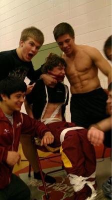 a-touch-of-frost:  godtiercosbytop:  fyeridan:  “This a photograph taken from the teenager (shirtless guy) named Austin Schafer’s Twitter account, of a kid being tied up and beaten by upper classmen at Columbia High School in Nampa, Idaho. This is