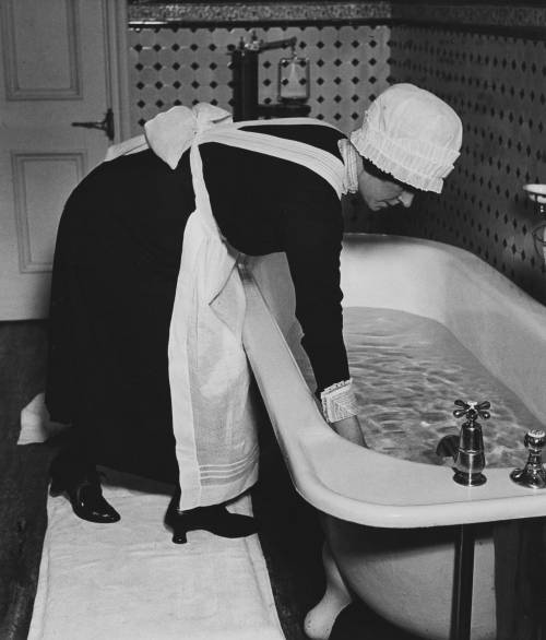 Bill Brandt - Parlourmaid Preparing a Bath before Dinner, 1937 Nudes &amp; Noises  