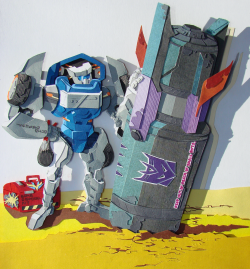 curlicuecal:  “Don’t worry– panic keeps me focused.” -Tailgate I just had to do a papercraft of this sweetheart and I adore this image. Tailgate tries so hard.  From the cover of Transformers: More Than Meets the Eye #12 [x x] 