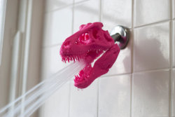 naughtier:  wickedclothes:  T-REX Skull Shower HeadTurn your shower pre-historic with this T-Rex skull for a shower head.  Since all water is recycled and reused anyway, it’s already like you’re bathing in the Mesozoic era. Sold on Etsy.  I want