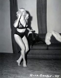 burleskateer:   Rita Grable dances around barefoot.. From a 50’s-era photo series shot by Irving Klaw..   