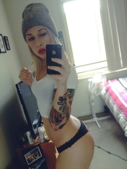 hot tattooed blonde selfshot her great ass and natural boobs in sexy lingerie
