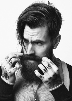 alabaster-angel:  beard-and-piercings:  someday I hope to be as attractive as this man  Mmm. This. All of this. There is only one thing sexier than a bearded man with tattoos, and that’s a suited/naked one laying next to me. Yupp.  Oh fuck yes please!