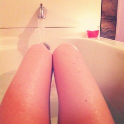 letsget0ut0fhere:  Having a bath at 1 in the morning. (Yes, the generic white girls legs in bath tub with a candle photo. Deal with it) 