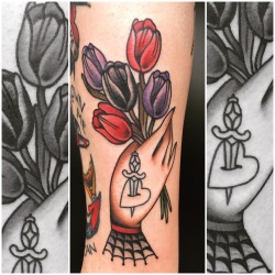 electrictattoos:  sellyourseconds:  Tulips on my friend Debbie. Thanks girl! For appointments: moira.blijleven@gmail.com   Moira Ramone