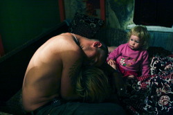 fohk:  These shocking photographs show what life is like for a little girl living with parents gripped by hard drug addiction. Parents Pasha and Lilya, from St Petersburg, seem oblivious to their two-year-old daughter Anfisa, who craves their attention