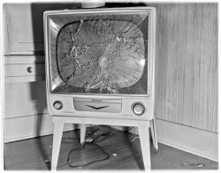 nemfrog:  TV set damaged in house fire. July 5, 1960.