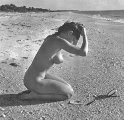 whenpussieswerefurry:  oldschoolgarage:  Bettie Page on the beach  Bettie was a magnificent specimen, wasn’t she”