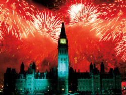 There’ll be a hot time in the old town tonight (fireworks silhouette the Peace Tower on Parliament Hill, Ottawa, on Canada Day)