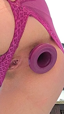 secretanalwhore:  Just having a little fun this morning! Thinking about changing my barbells to hoops tonight! I love playing with my tunnel plug.
