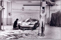 dusty woman in a garage, by Helmut Newton