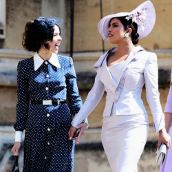 misskamala:  Priyanka Chopra and Abigail Spencer hold hands as they arrive at the Royal Wedding at St. George’s Chapel at Windsor Castle on Saturday morning (May 19) in Windsor, England.