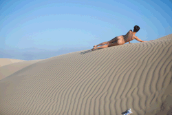 Sometimes Roarie interrupts a shoot to roll down a sand dune.