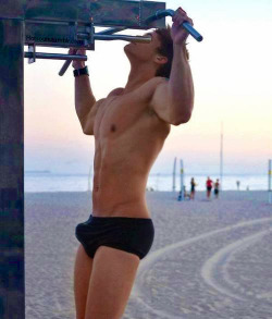 billionairesociety:  dude-on-demand:  An Awkward Beach Boner  Yes I know you get turned on when I give you orders in public. I know your boy penis will get hard in that unlined speedo. Off you go. Go do 30 pull ups while my client and I watch. Good boy