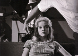 Director Stanley Kubrick took this photo of Sue Lyon being primped by the make up artist on the set of Lolita