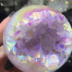 sixpenceee:  The above is an angel aura geode sphere. It’s so pretty! (Source)