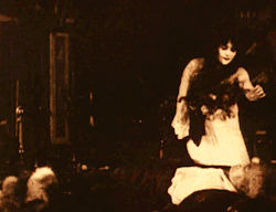 nitratediva:  Theda Bara sprinkles rose petals over her latest victim in A Fool There Was (1915). 