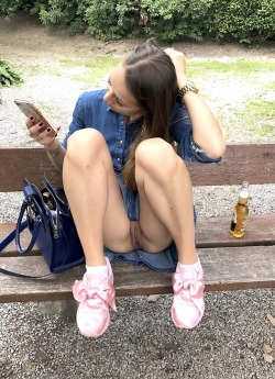 carelessinpublic:  Showing her pussy in a short dress in a park 