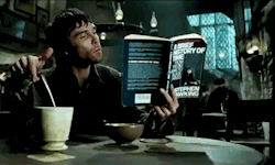 gallifrey-feels:  earthgirldonna:  feferipixies:  the-fandoms-are-cool:  everythingis19:  cosmicsyzygy:  Look, I made a gif of this most awesome wizard at the Leaky Cauldron!  DUDE IS READING ‘A BRIEF HISTORY OF TIME’ BY STEPHEN HAWKING I NEVER REALIZED