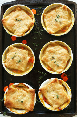 justfoodsingeneral:  Thyme &amp; White Bean Pot Pies“10-ingredient vegan pot pies infused with white wine and fresh thyme. Flaky pie crust covers a savory, vegetable-white bean filling. A hearty plant-based meal that’s especially comforting in the