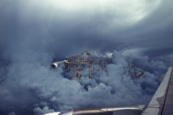   Abandoned roller coaster in the clouds,