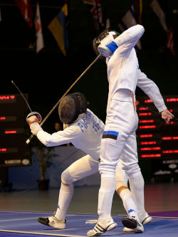 modernfencing:  [ID: two epee fencers in-fighting.]