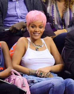 Rihanna. ♥  Oh wow she looks so cute and sexy with pink hair.♥