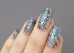 ladycrappo:Tutorial: Kintsugi NailsHere’s how I did this design— it’s actually pretty simple.  You’ll need a couple of shades of gray polish, black polish or acrylic paint, metallic polish or paint, a makeup sponge, and a small brush.1. Start