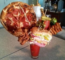 randyliedtke:  Relaxing with a Bloody Mary Recipe: Ice, Bloody Mary Mix, Vodka, Footlong Sub, 4 Piece Fried Chicken, Peperoni Pizza, 2 Double Cheese Burgers, Another Bloody Mary, Onion Rings, Fries, Garlic Bread, Pickles, Olives, Onion, Lemon, Lime,