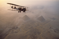 natgeofound:  In the light of early morning, the Vimy circles the pyramids at Giza on a dawn tour, May 1995.Photograph by James L. Stanfield, National Geographic