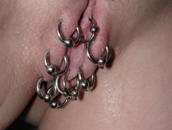 Nicely pierced pussy.