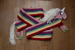 death-by-lulz:  ninonisanoctopus: I completely forgot to post it but my mum finished my Lady Rainicorn scarf some days ago ! The result is simply awesome and I love it, thanks mum ♥ My lovely followers, please follow this blog immediately! 