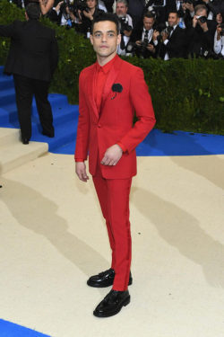 critic-corner:Rami Malek at Met Gala 2017 : Rami was easily the best-dressed male celebrity at the event that night! I’m loving the red wool and mohair tuxedo by Dior Homme with matching shirt, black shoes and flower brooch. Simply perfect!