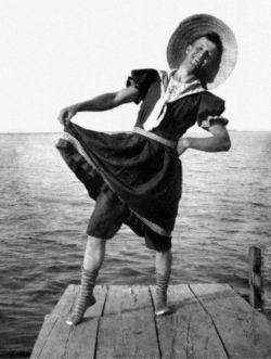 ukulele-ikes:  A man exhibits the women’s bathing suit he is wearing, 1910’s (x) 