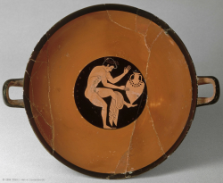 via-appia:  Attic type B bilingual vessel, komos scene - komast trying to balance an amphora on his foot, one of the games of skill that Athenians played at banquets Greek, Attic, 510 - 500 BC 