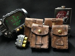 gearboxleather: Fallout family photo! These are the costume accessories I made inspired by the Fallout universe. You can get your own set of Fallout pouches in my shop! 