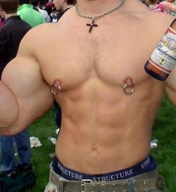 nippladdiction:  canucksd:  apadravya-piercing:  Shirtless body builder parties half naked with his Budweiser in hand, and ginormous nipple rings dangling off his huge male nipples, protruding and perky.  Bud!  Pierced nipples like all men should have!